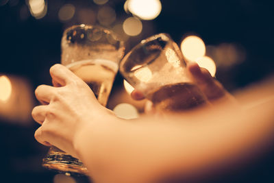 Close-up of hand holding wine glass