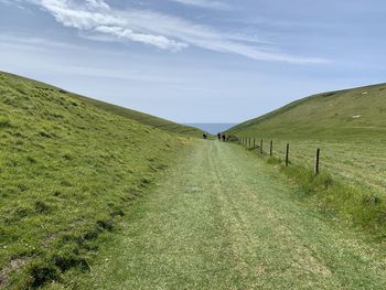 Scenic view of land against sky