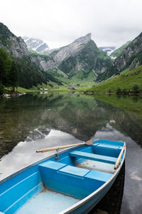 View of boats in calm lake