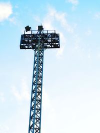 Low angle view of communications tower against sky