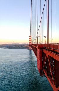 View of suspension bridge over sea