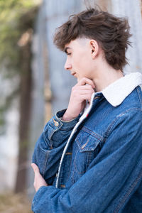 Side view portrait of trendy teenager