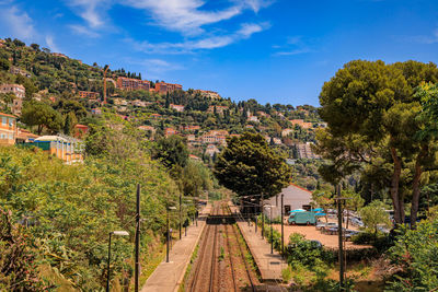 High angle view of trees and houses against sky