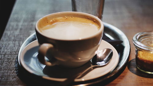 Close-up of coffee cup on table