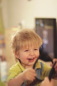 Cute smiling boy at home