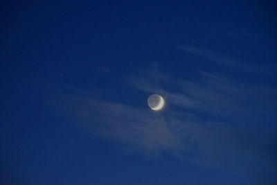 Low angle view of moon in sky