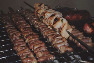 Close-up of meat on barbecue grill