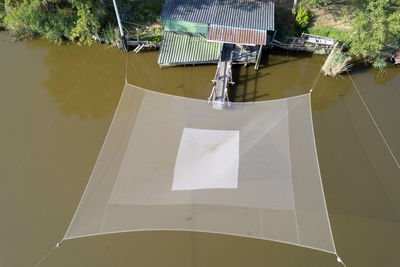 Aerial photographic documentation of old fishing posts with nets in the natural park of lucca