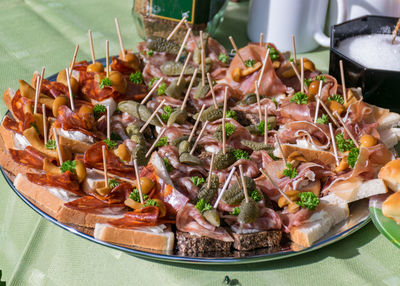 Delicious close-up of food on the festive table, picnic in the garden, garden festivities