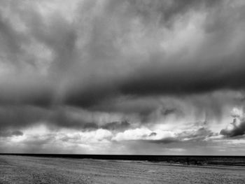 Storm clouds over land