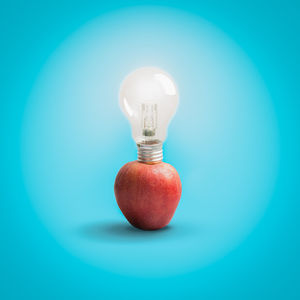 Close-up of illuminated light bulb