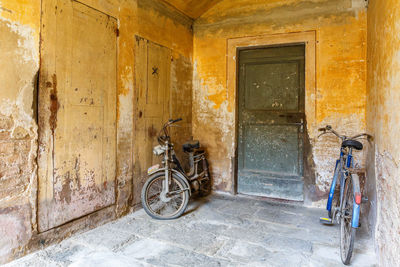 Garage with a moped and a bicycle