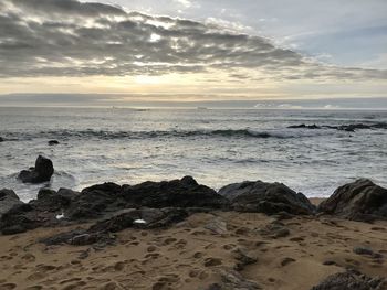 Scenic view of sea against sky during sunset