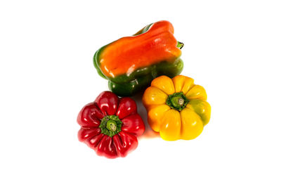 Close-up of bell peppers against white background