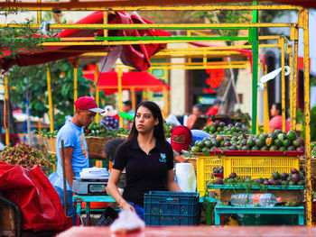 Young couple at market stall