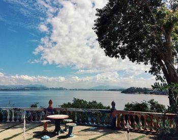 Chairs on table at seaside