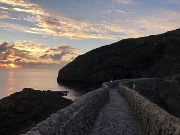 Scenic view of sea against sky at sunset