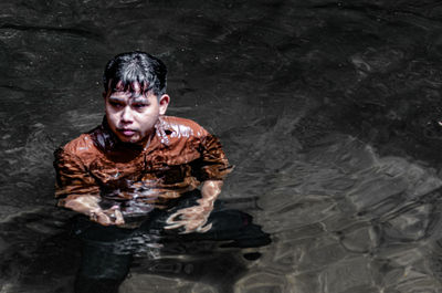 Portrait of a man in water