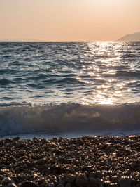 Scenic view of sea during sunset