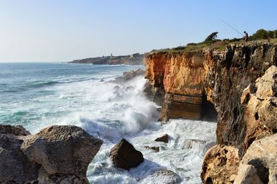 Scenic view of sea against clear sky