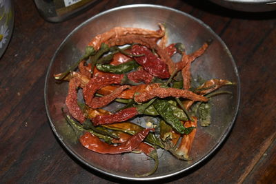 High angle view of meat in container on table