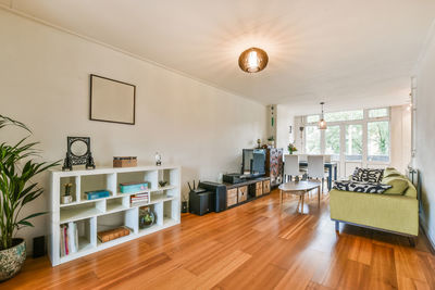 Chairs and tables on hardwood floor at home