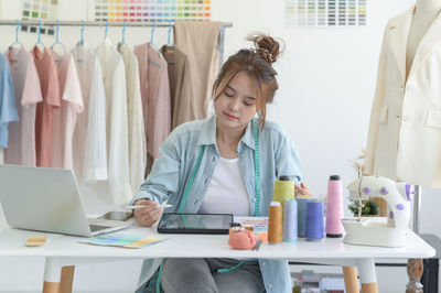 Female doctor working in office
