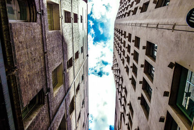 Low angle view of skyscrapers against sky
