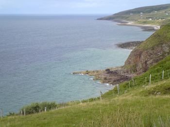 Scenic view of sea against blue sky