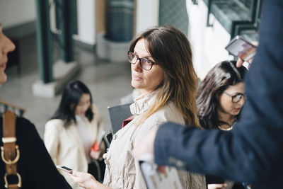 High angle view of female entrepreneurs on staircase in office