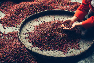 High angle view of person preparing food on table