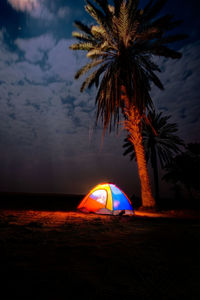 Tent against sky during sunset