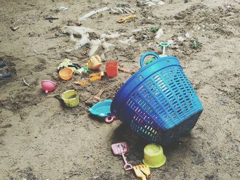 High angle view of toys on beach
