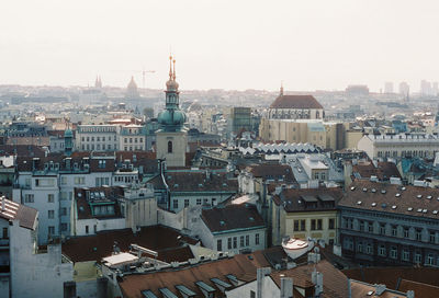 High angle view of buildings against clear sky