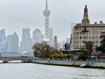 View of buildings around suzhou creek in shanghai, china on a rainy day
