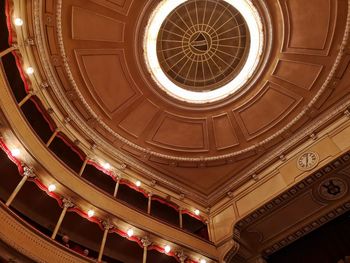 Low angle view of illuminated ceiling