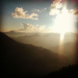 Scenic view of mountains against sky during sunset