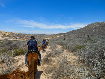 People riding horse