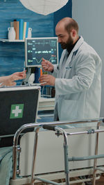 Portrait of doctor standing in hospital