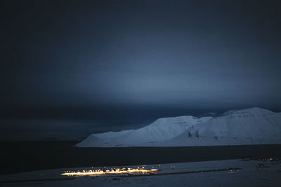 Scenic view of sea against sky at night