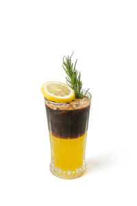 Yellow drink against white background