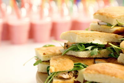 Close-up of sandwiches in plate on table