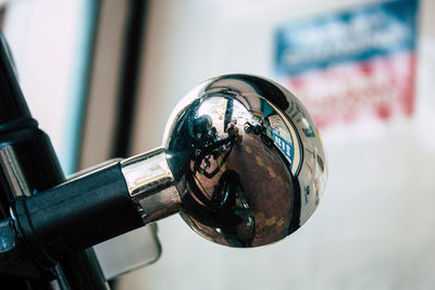 Close-up of bicycle on glass