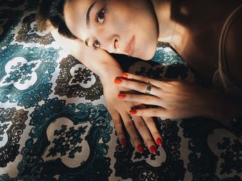 High angle portrait of woman lying down