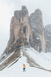 Scenic view of snow covered mountain against sky