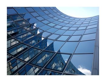 Low angle view of modern building against sky