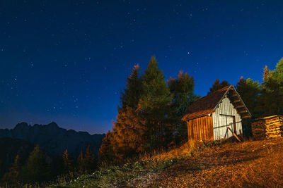 Clear and starry sky. night in the village of monte lussari. italy
