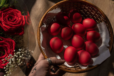 High angle view of red berries in basket