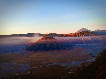 View of volcanic landscape against sky