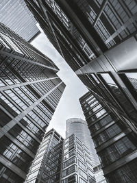 Low angle view of modern buildings against sky
